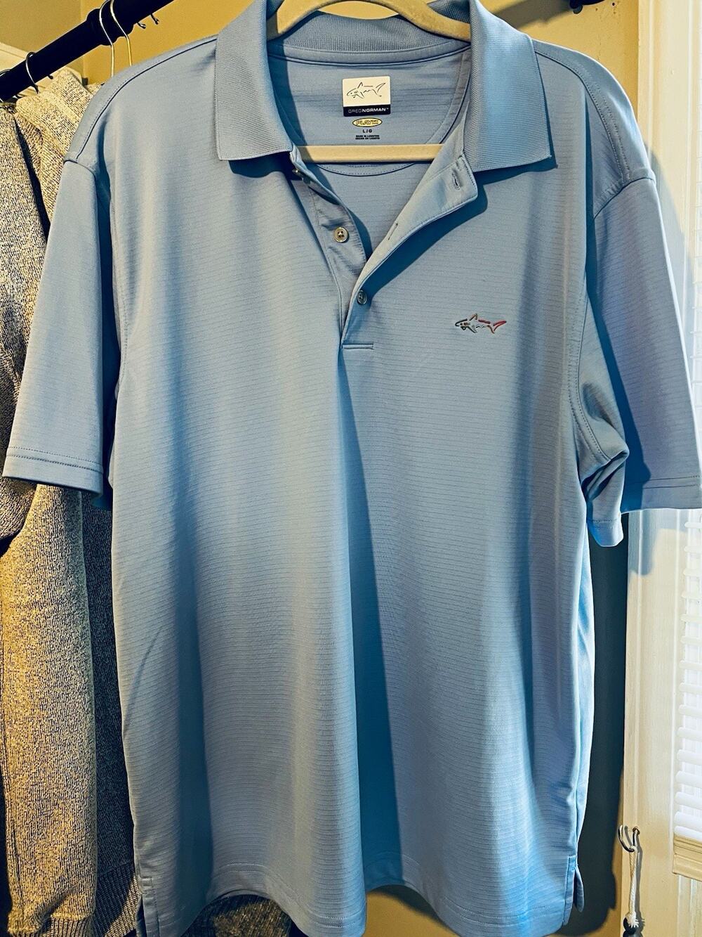 Greg Norman Play Dry Men’s Blue Solid Polyester Knit Polo L Shark Logo Golf